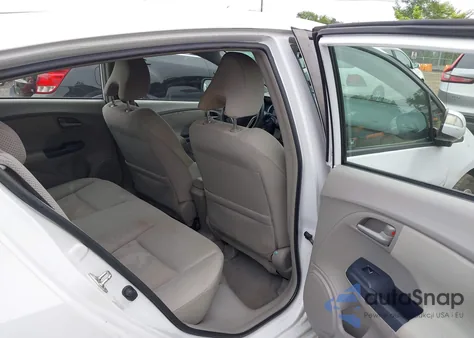 2010 Honda Insight Ex from USA, damaged, VIN JHMZE2H7XAS018483